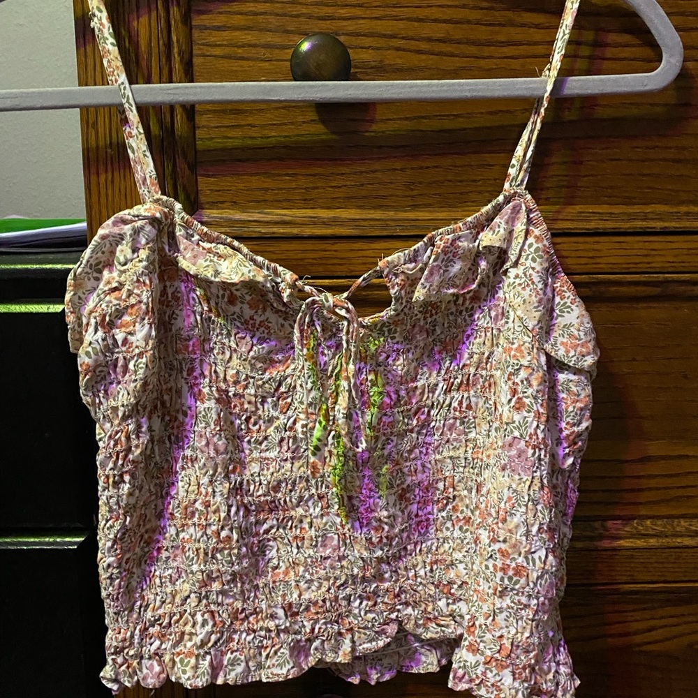 A cropped tank top with cute tie on top